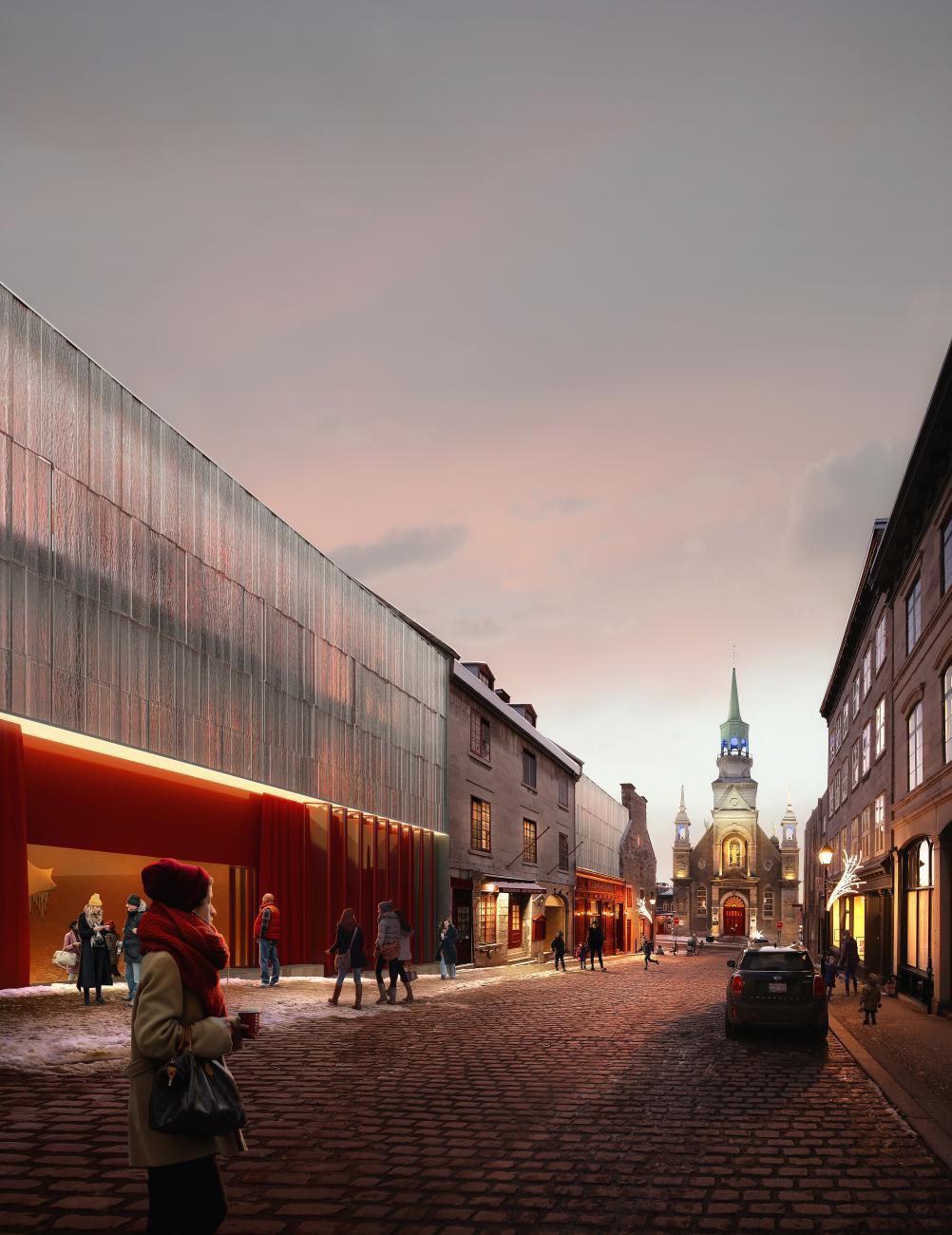 Glass facade with red lower band sits in a historic district.