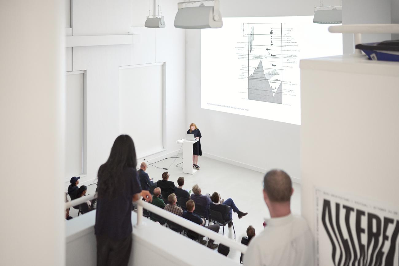 Assistant professor Brittany Utting speaks before the opening of The Sixth Sphere, an exhibition she curated. Photo: Jake Eshelman. Assistant professor Brittany Utting speaks before the opening of The Sixth Sphere, an exhibition she curated.