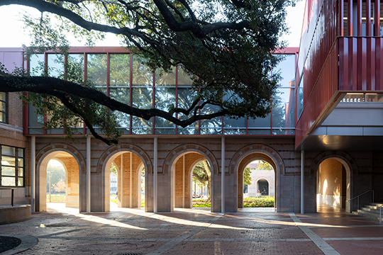 View through Rice School of Architecture courtyard to Rice's academic quad