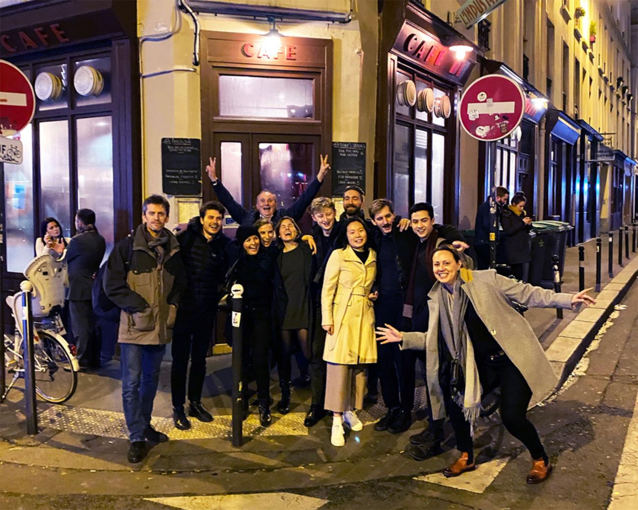 Group photo in front of a cafe in Paris