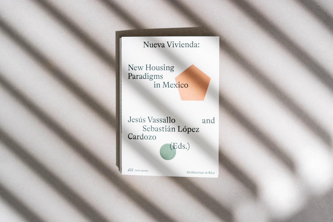 cover of white book with brown octagon and green circle over text of title, Nueva Vivienda
