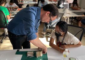 Professor helping student 