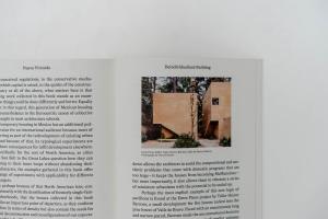 Image of a two page spread of building project from another angle